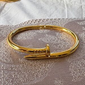 Nail bangle bracelet